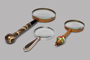Lot of three lenses, two with cloisonné handles and one with silver and tortoiseshell handle