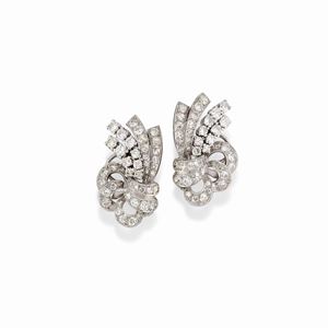 A 18K white gold, platinum and diamond earrings. circa 1950
