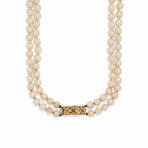A 18K yellow gold, ruby and cultured pearl necklace