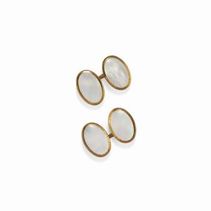  - A metal gilded, mother of pearl cufflinks, 20th Century