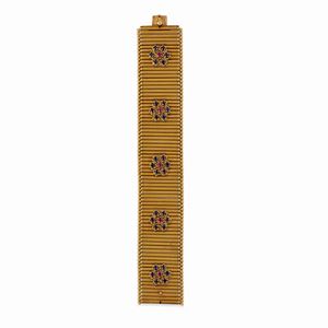 A 18K yellow gold, ruby and sapphire bracelet, circa 1950