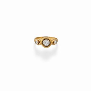 A 18K two color gold and diamond ring