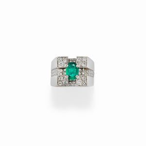A 18K white gold, emerald and diamond ring