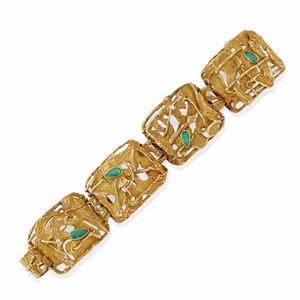 A 18K yellow gold and emerald bracelet 