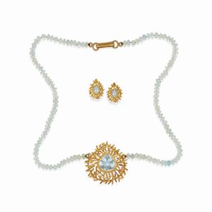 A 18K yellow gold and aquamarine with necklace and earrings