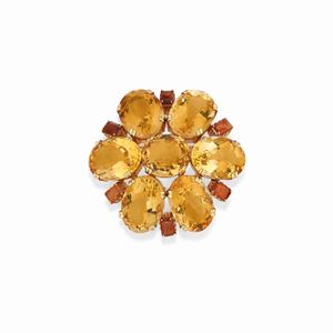 A 18K yellow gold, yellow and orange quartz brooch