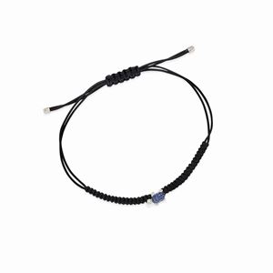 A 18K white gold sapphires, diamonds and cotton strap bracelet