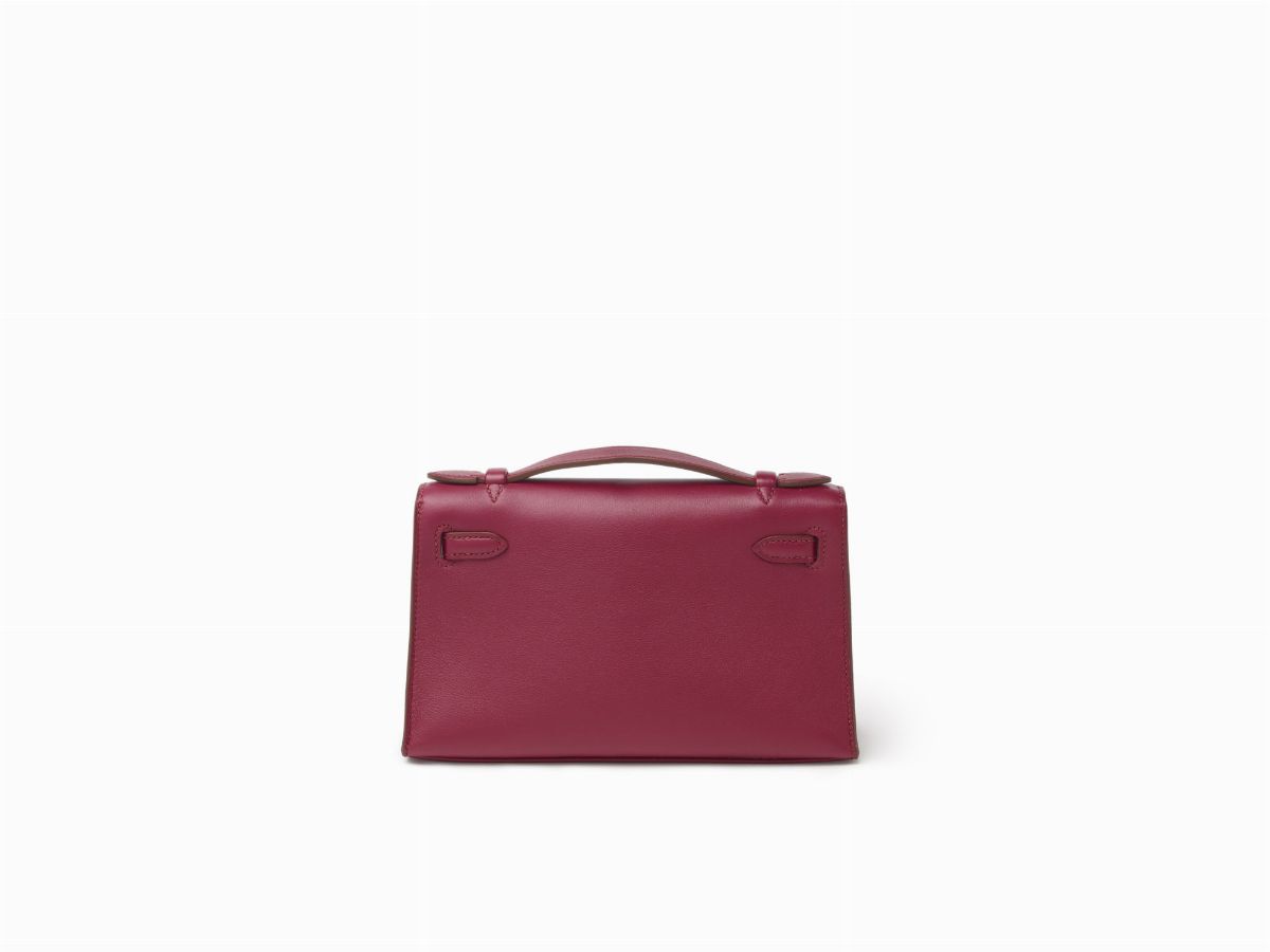 Hermès - Kelly Mini Pochette, pelle swift rosso rubino con dettagli in palladio, 22 cm, 2011