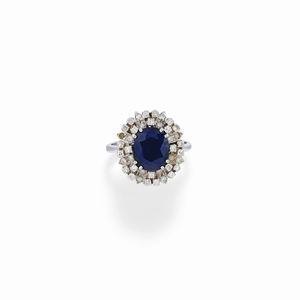  - A 18K white gold, sapphire and diamond ring, defects