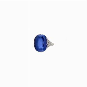 A platinum, diamond and synthetic sapphire ring, early 20th Century