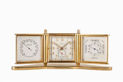 Orologio da tavolo con svegliarino, calendario, termometro e barometro, anni '60
