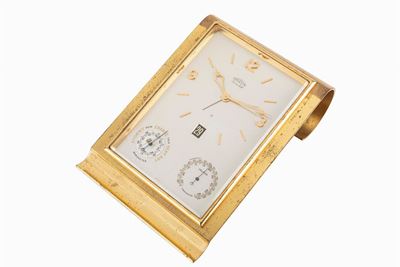 Orologio da tavolo con svegliarino, termometro, barometro e data, anni '60