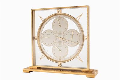 Orologio da tavolo Rembrance con quattro fusi orari, cassa in ottone dorato, anni ‘60
