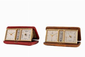 Lot of two Looping travel clocks with alarm, thermometer and barometer, ‘50s