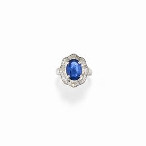 A 18K white gold, diamond and sapphire ring