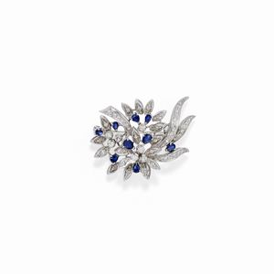 A 18K white gold, diamond and sapphire brooch, circa 1970