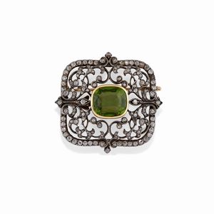 A 18K yellow gold and silver, diamond and green glass paste pendant-brooch