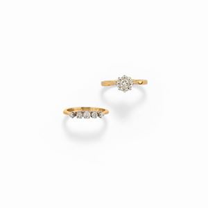 Two platinum, 18K yellow gold and diamond rings, England, 20th century