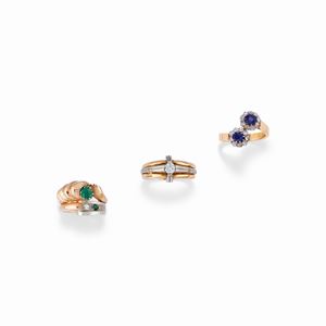 Three 18K red and white gold, diamond, sapphire and emerald rings