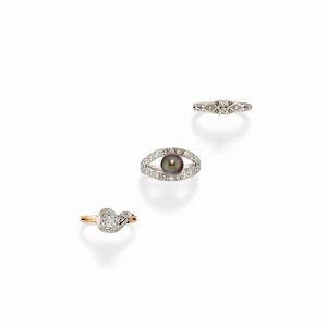 A 18K white and red gold, diamonds and tahiti pearl lot of three ring