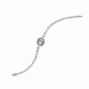 A 18K white gold, diamonds and aquamarine bracelet, France, 20th century