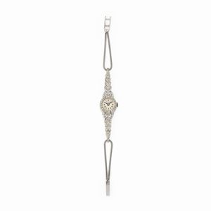Invicta - A 18K white gold and diamond lady's wristwatch, 1930, Invicta