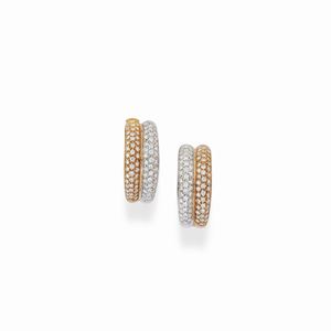 A 18K two color gold and diamond earrings, Recarlo