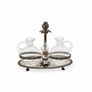 A silver oil and vinegar service, crystal bottles, with box