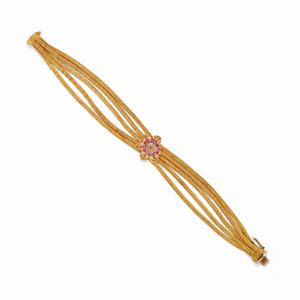 A 18K yellow gold and ruby bracelet, circa 1960