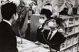 Sales girl and costumer at shop in Tokyo