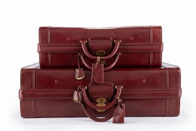 Due valigie rigide in pelle color bordeaux, anni '70