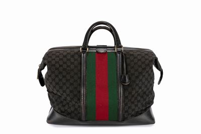 Borsone da viaggio in tessuto GG nero con finiture in pelle