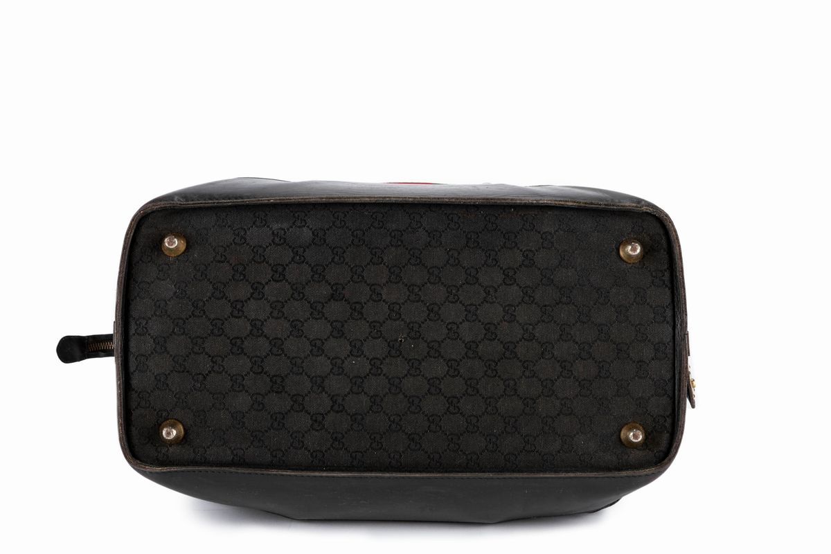 Gucci - Borsone da viaggio in tessuto GG nero con finiture in pelle