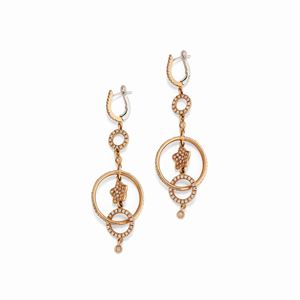 A two color gold and diamond earrings