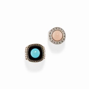 Two two-color gold, turquoise paste, coral, onyx and diamond rings