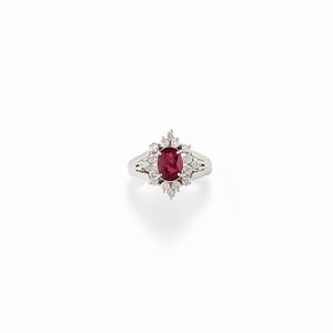 A platinum, ruby and diamond ring