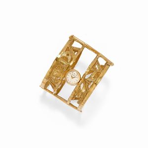A 18K yellow gold lady's wristwatch-bracelet, circa 1970/80, Rolex