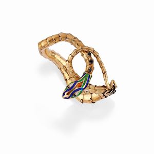  - A 14K yellow gold, enamel and sapphire bracelet