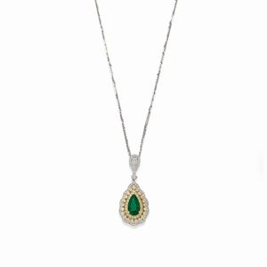 A 18K two-color gold, emerald and diamond necklace