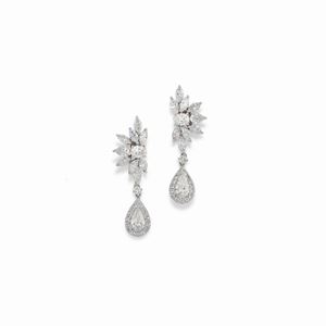  - A 18K white gold and diamond earrings