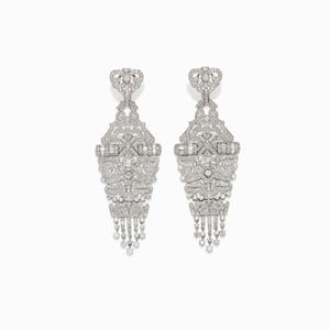 A 18K white gold and diamond earrings