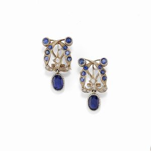  - A 18K white gold, sapphire and diamond earrings