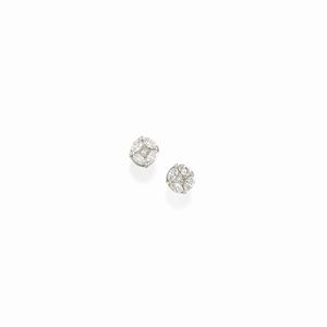 A 18K white gold and diamond earrings