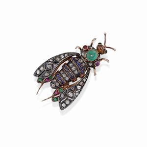 A 18k red gold diamond, sapphire, ruby and emerald brooch