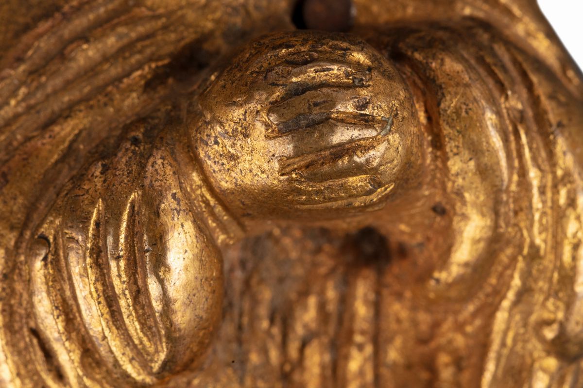 Lotto Composto da Tre Antichi Piccoli Oggetti in Bronzo, di Cui Due Dorati