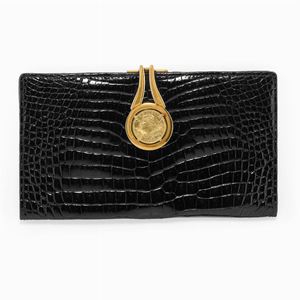 A gold coin and leather passport holder, signed Albanese