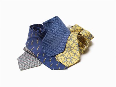 Set di quattro cravatte in seta con diverse fantasie e colori