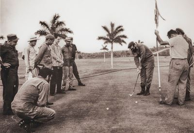 Fidel Playing Golf