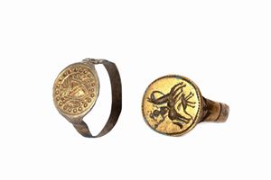  - Two old bronze rings, with seals