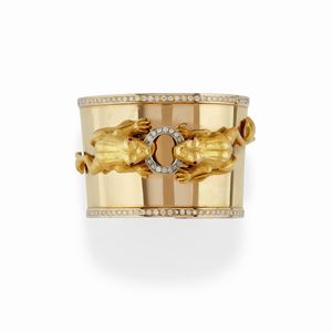 A 18K yellow gold, diamond and ruby bangle, Marta Marzotto